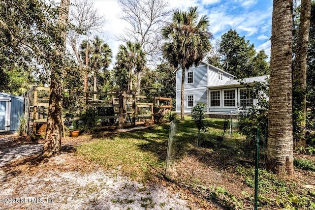 view of yard featuring fence