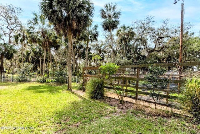 view of yard featuring fence