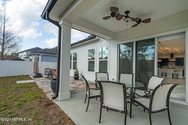 view of patio / terrace featuring ceiling fan