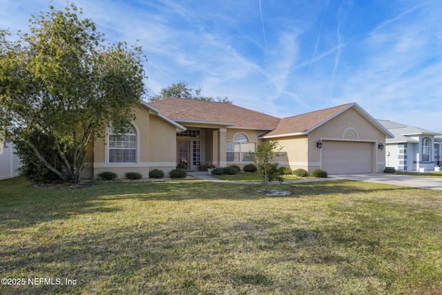 ranch-style house featuring a garage and a front yard