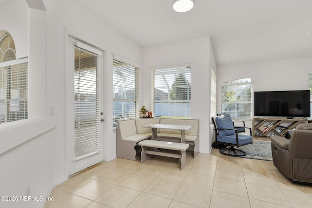 living room featuring light tile patterned flooring