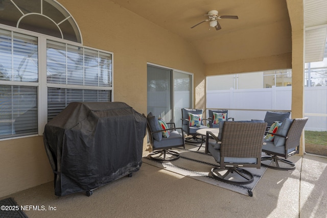 view of patio / terrace with area for grilling and ceiling fan