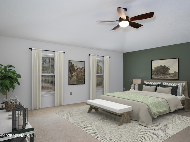 bedroom featuring light carpet and ceiling fan