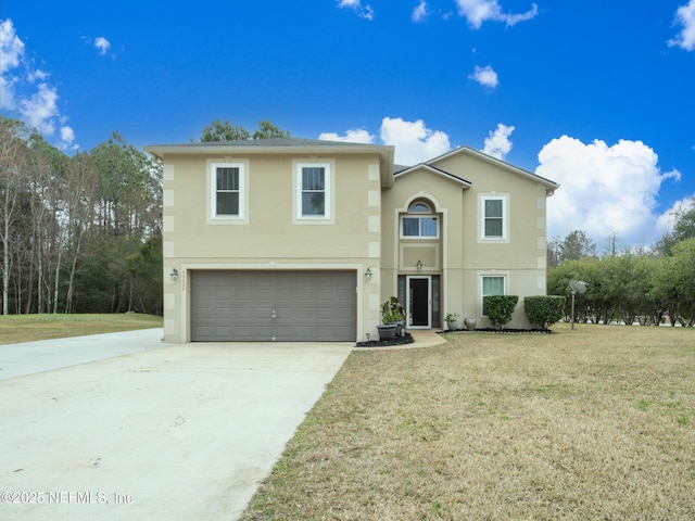 view of front property with a garage and a front lawn