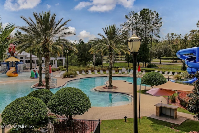 view of pool featuring a water slide