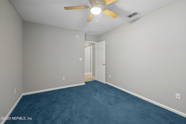829 Songbird Dr, Orange Park, FL 32065 - carpeted spare room with a textured ceiling, baseboards, and visible vents