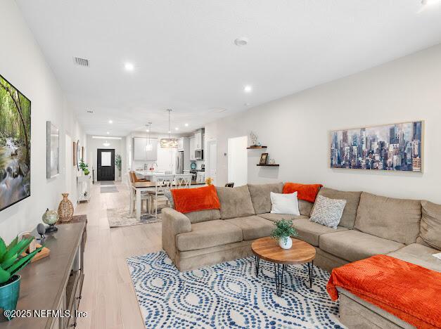 living room with light wood-type flooring