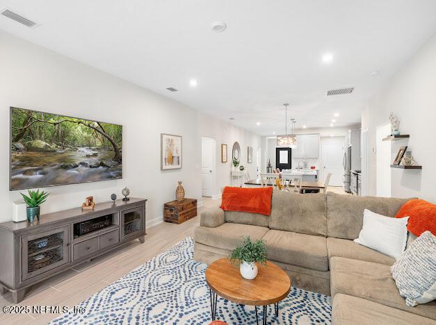 living room featuring light wood-type flooring