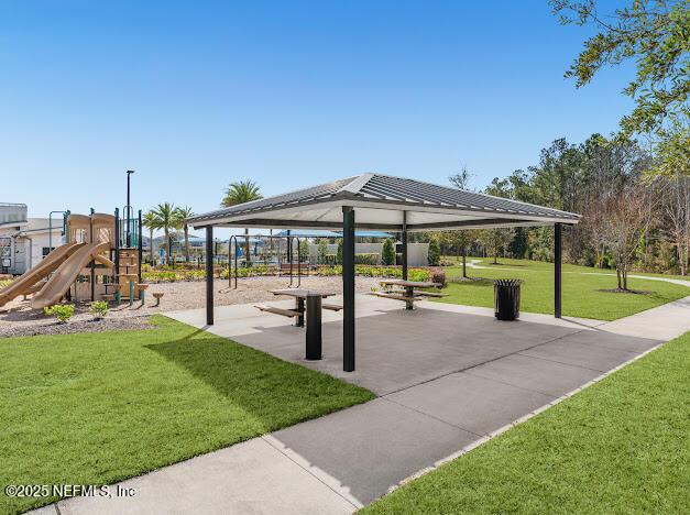 surrounding community with a gazebo, a yard, and a playground