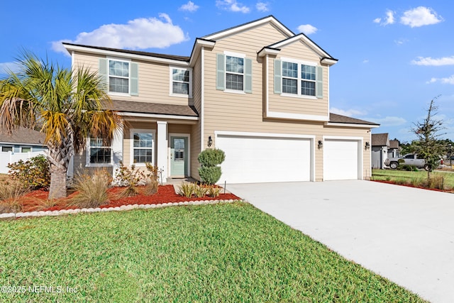 view of front facade with a garage and a front yard