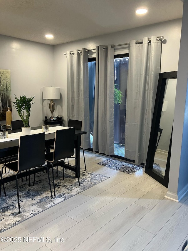 office area featuring recessed lighting, wood finished floors, and baseboards