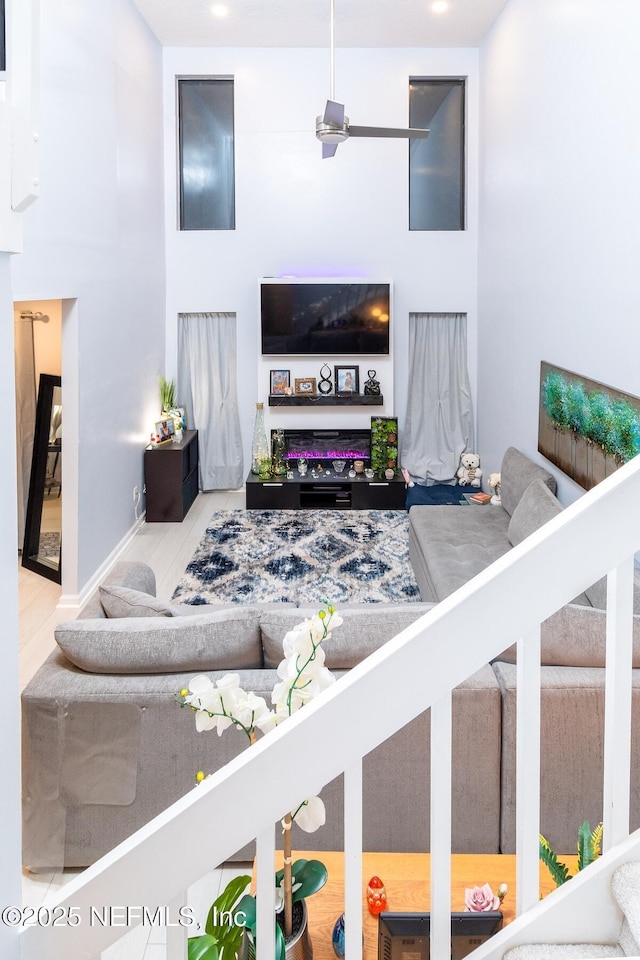 living room featuring a high ceiling