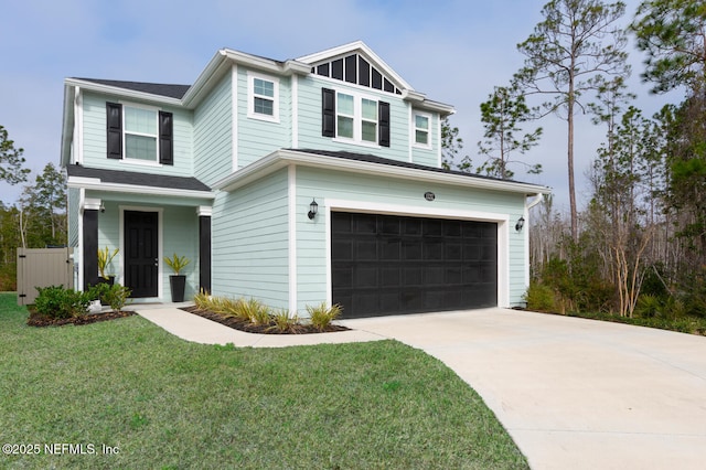 view of front of house featuring a garage and a front yard