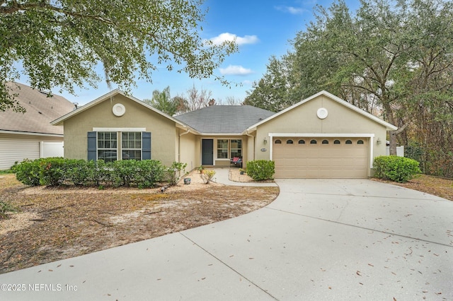 ranch-style home featuring a garage