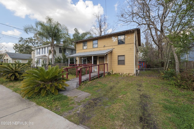 view of front facade with a front yard