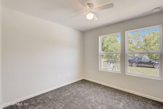 unfurnished room with carpet floors and ceiling fan