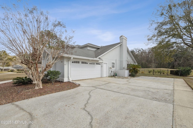 744 Cherry Grove Rd, Orange Park, FL 32073 - view of home's exterior with a garage