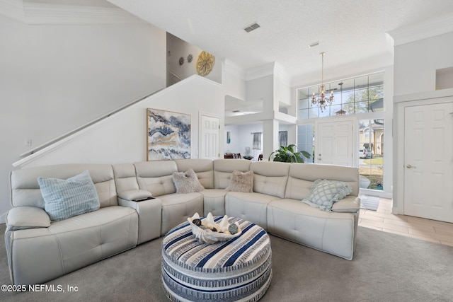 744 Cherry Grove Rd, Orange Park, FL 32073 - living room with a notable chandelier, crown molding, a towering ceiling, and carpet