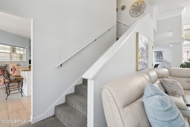 744 Cherry Grove Rd, Orange Park, FL 32073 - stairway with crown molding and a healthy amount of sunlight