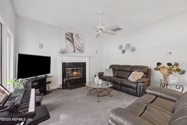 744 Cherry Grove Rd, Orange Park, FL 32073 - living room with ceiling fan, light colored carpet, and a high end fireplace