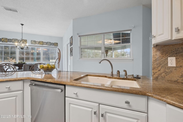 744 Cherry Grove Rd, Orange Park, FL 32073 - kitchen with sink, dishwasher, white cabinetry, decorative backsplash, and decorative light fixtures