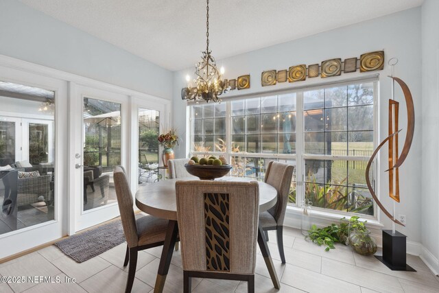744 Cherry Grove Rd, Orange Park, FL 32073 - sunroom / solarium with an inviting chandelier and a healthy amount of sunlight