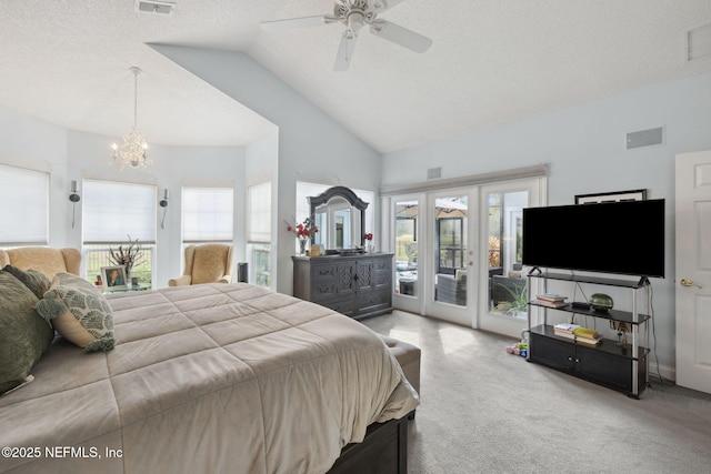 744 Cherry Grove Rd, Orange Park, FL 32073 - carpeted bedroom featuring multiple windows, vaulted ceiling, access to exterior, and french doors