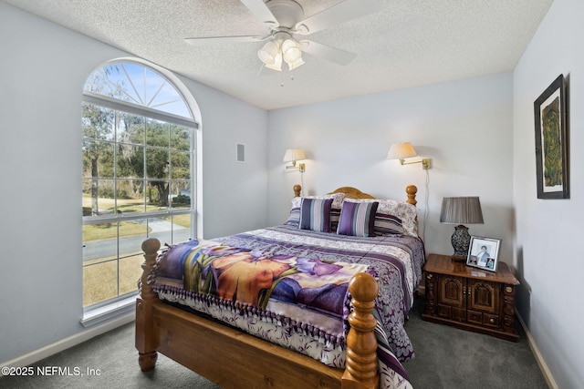 744 Cherry Grove Rd, Orange Park, FL 32073 - carpeted bedroom with multiple windows, ceiling fan, and a textured ceiling