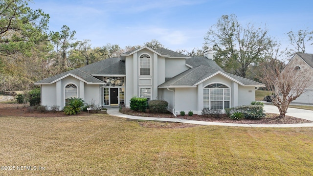 view of front property with a front yard