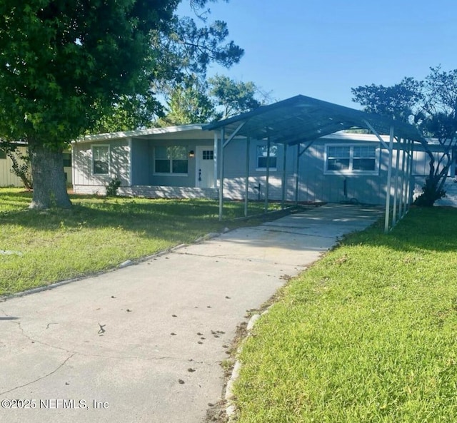 ranch-style home with a front lawn