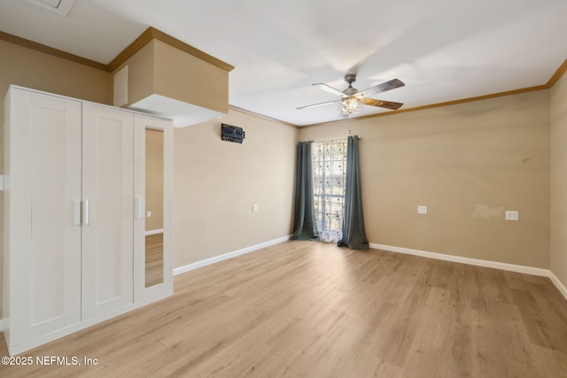 unfurnished bedroom with ornamental molding, ceiling fan, and light hardwood / wood-style floors