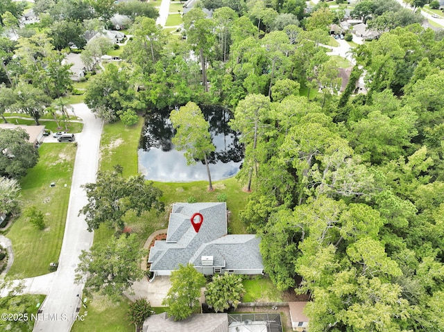 birds eye view of property featuring a water view