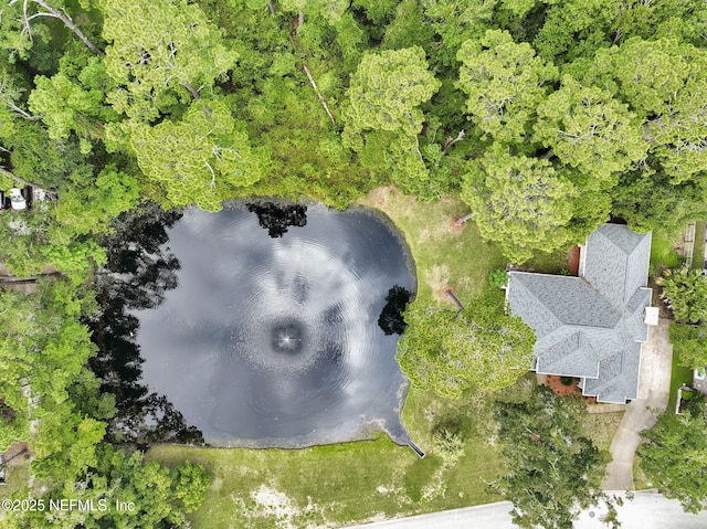 birds eye view of property featuring a water view