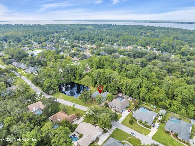 bird's eye view with a water view