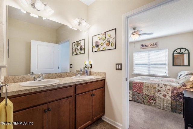 bathroom featuring ceiling fan and vanity