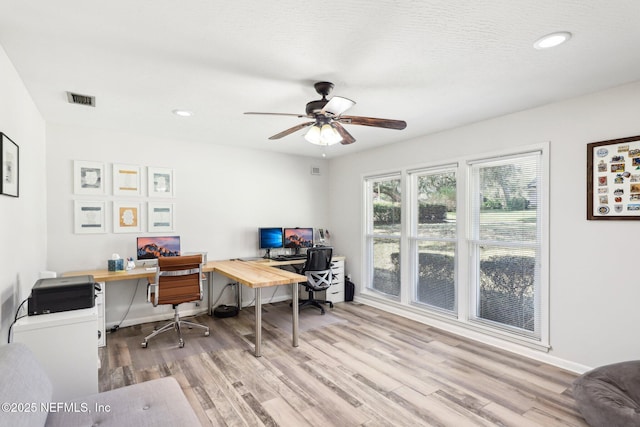 office area featuring recessed lighting, visible vents, ceiling fan, and wood finished floors