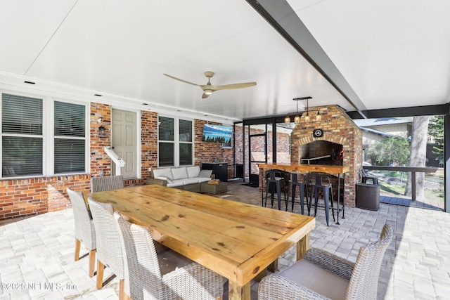 sunroom with ceiling fan