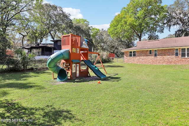 view of playground featuring a yard