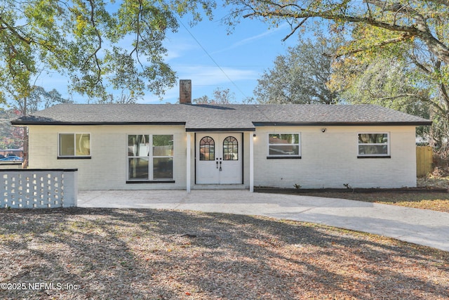 ranch-style house featuring a patio