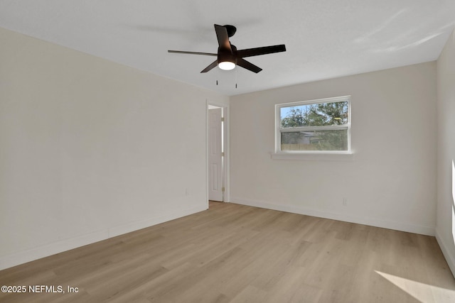 unfurnished room with light hardwood / wood-style floors and ceiling fan