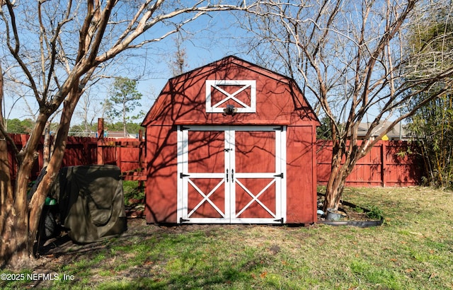 view of outdoor structure with a yard