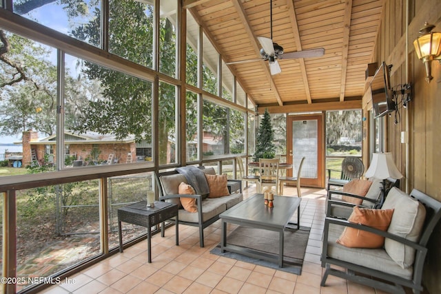 sunroom / solarium with ceiling fan, lofted ceiling, and wood ceiling