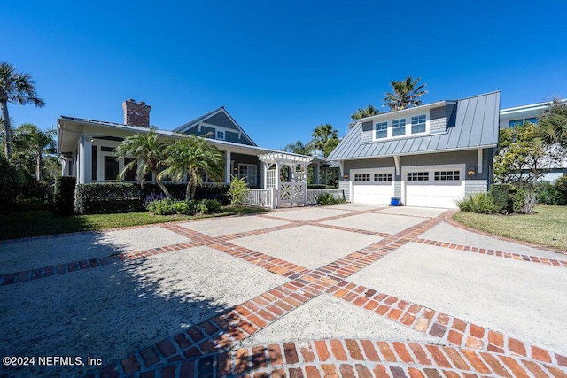 view of front of property featuring a garage