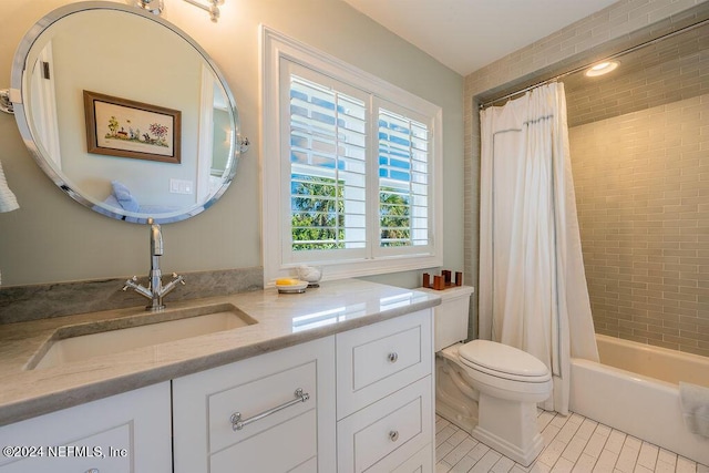 full bathroom featuring shower / bath combination with curtain, vanity, toilet, and tile patterned flooring