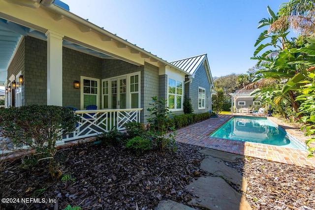 view of pool with a patio area