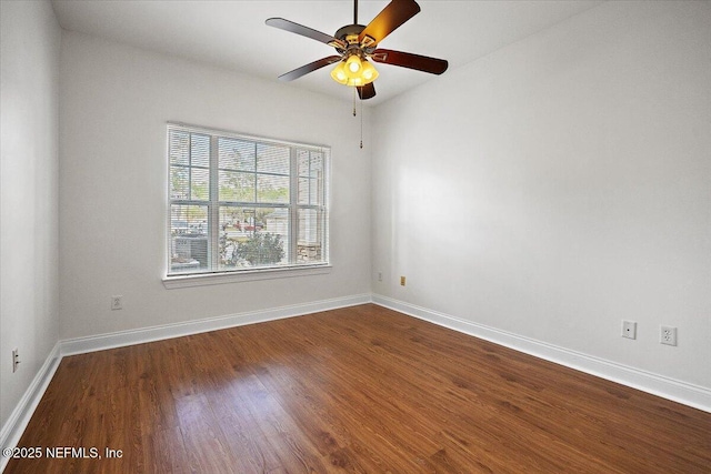 empty room featuring hardwood / wood-style flooring and ceiling fan