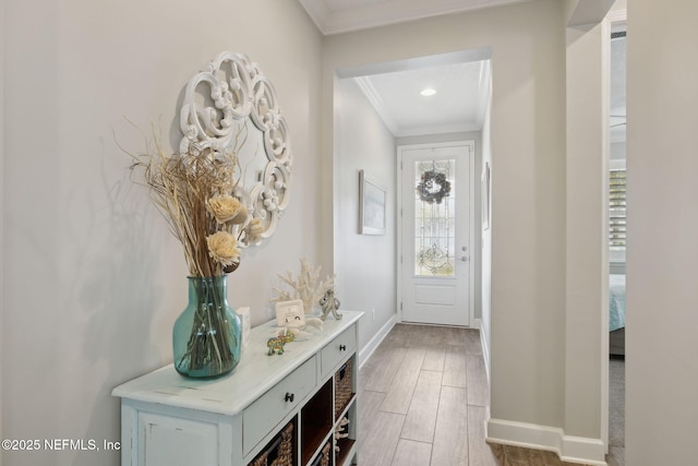 doorway to outside with ornamental molding