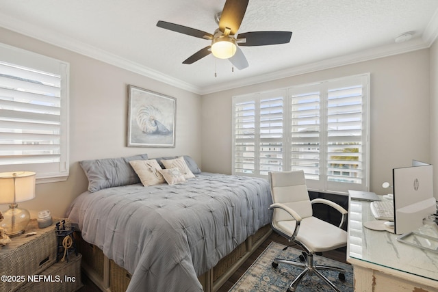 bedroom featuring ornamental molding and ceiling fan