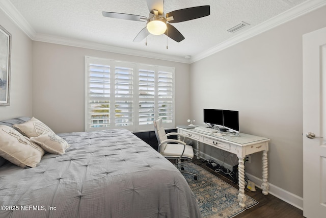 bedroom featuring wood-type flooring, crown molding, ceiling fan, and a textured ceiling