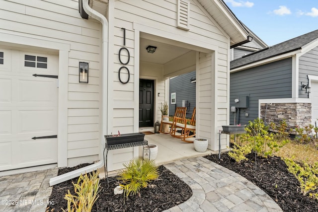 doorway to property with a porch